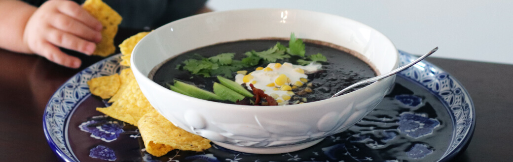 A bowl of black bean soup