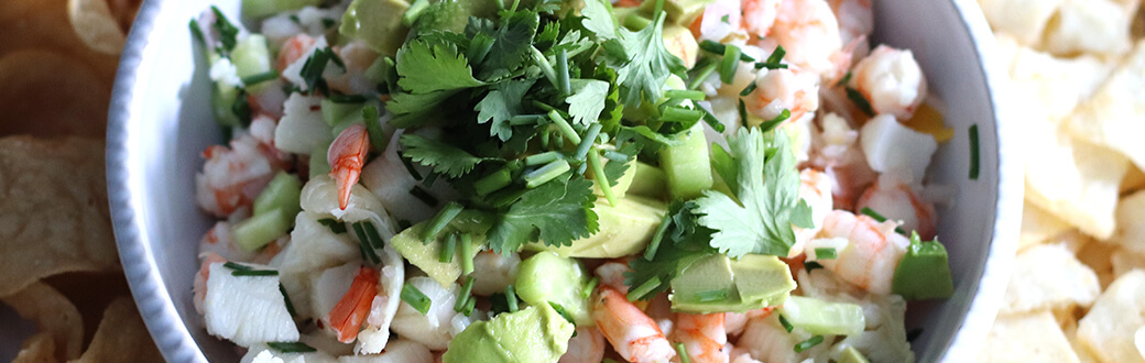 Sea bass and shrimp ceviche in a serving bowl.