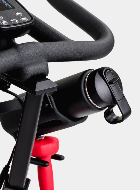Water bottle holder with water bottle on the BowFlex C6 Bike.