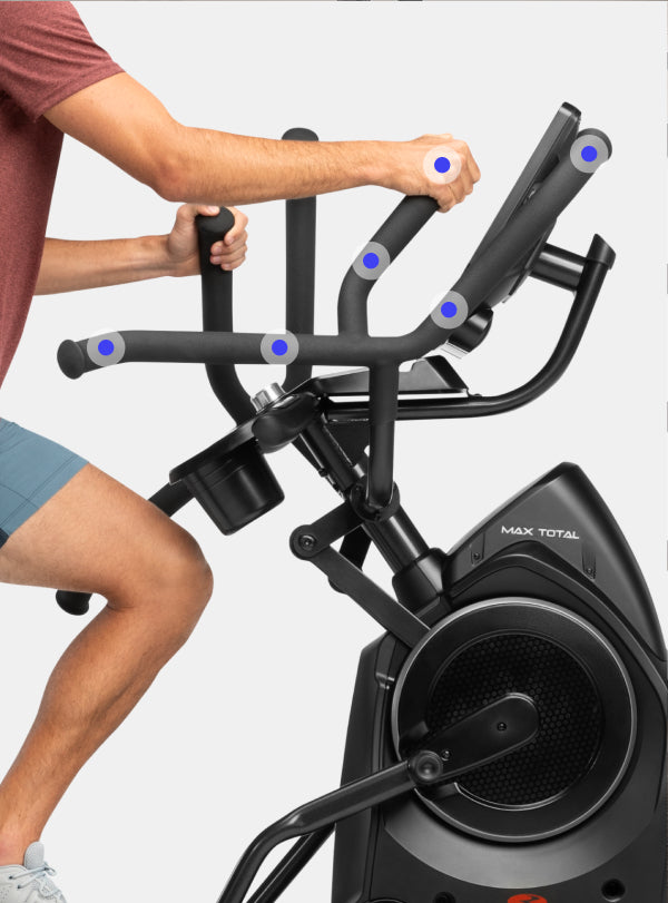 A person on a BowFlex Max Total 16.