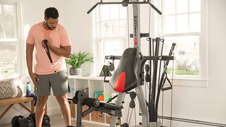 Man doing a standing biceps curl