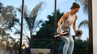 Woman exercising with the Results Series 52 dumbbell--thumbnail