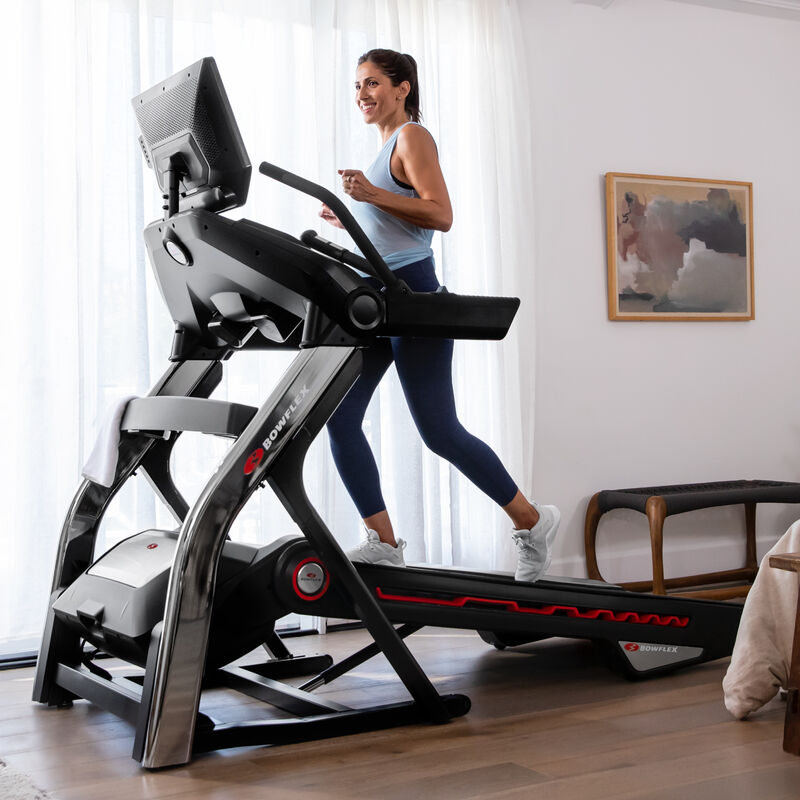 Woman using the Treadmill 22 - mobile expanded view