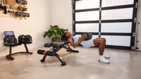 Woman exercising with a single Results Series 1090 dumbbell--thumbnail