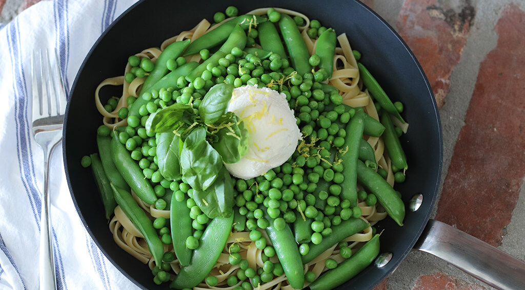 prepared summer fettuccine in a pan.