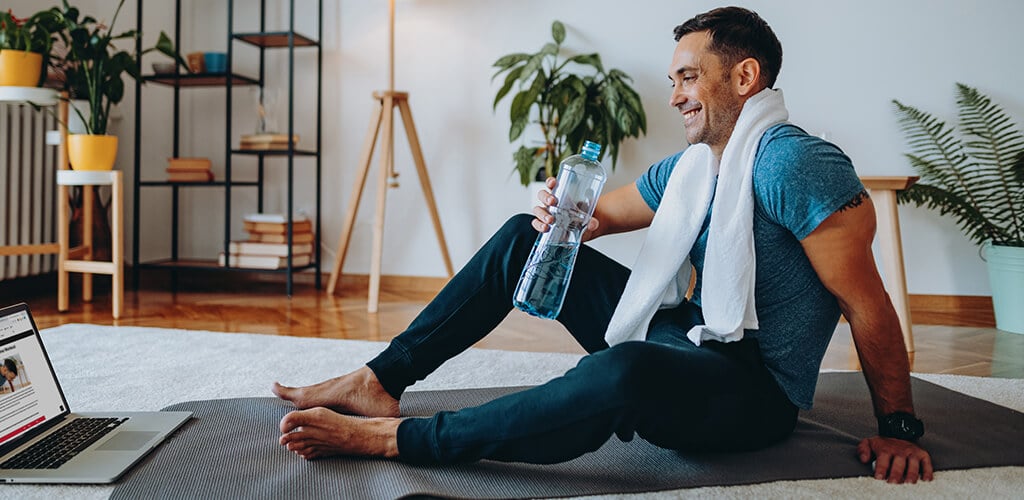 A man resting after a hiit workout