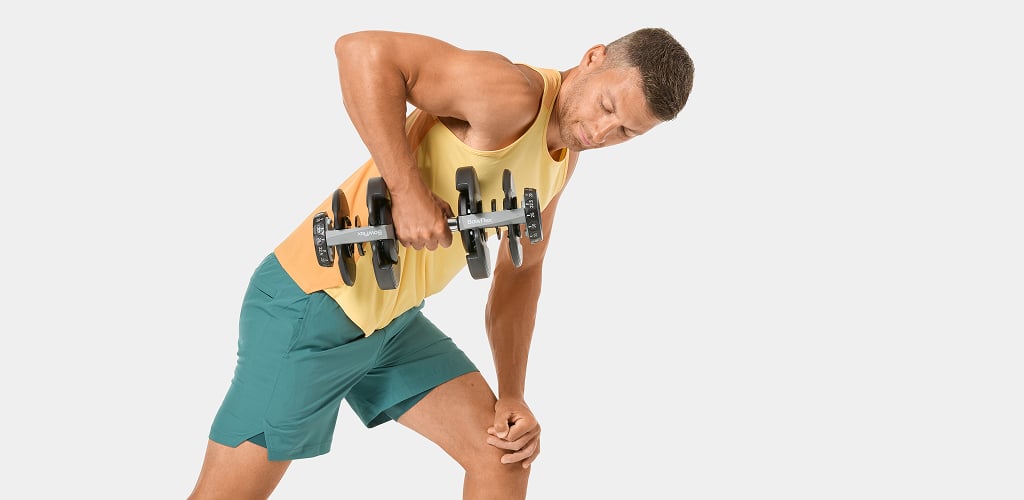 man using results series 552 dumbbell