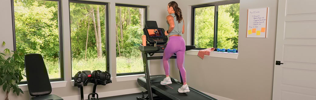 woman running on the treadmill