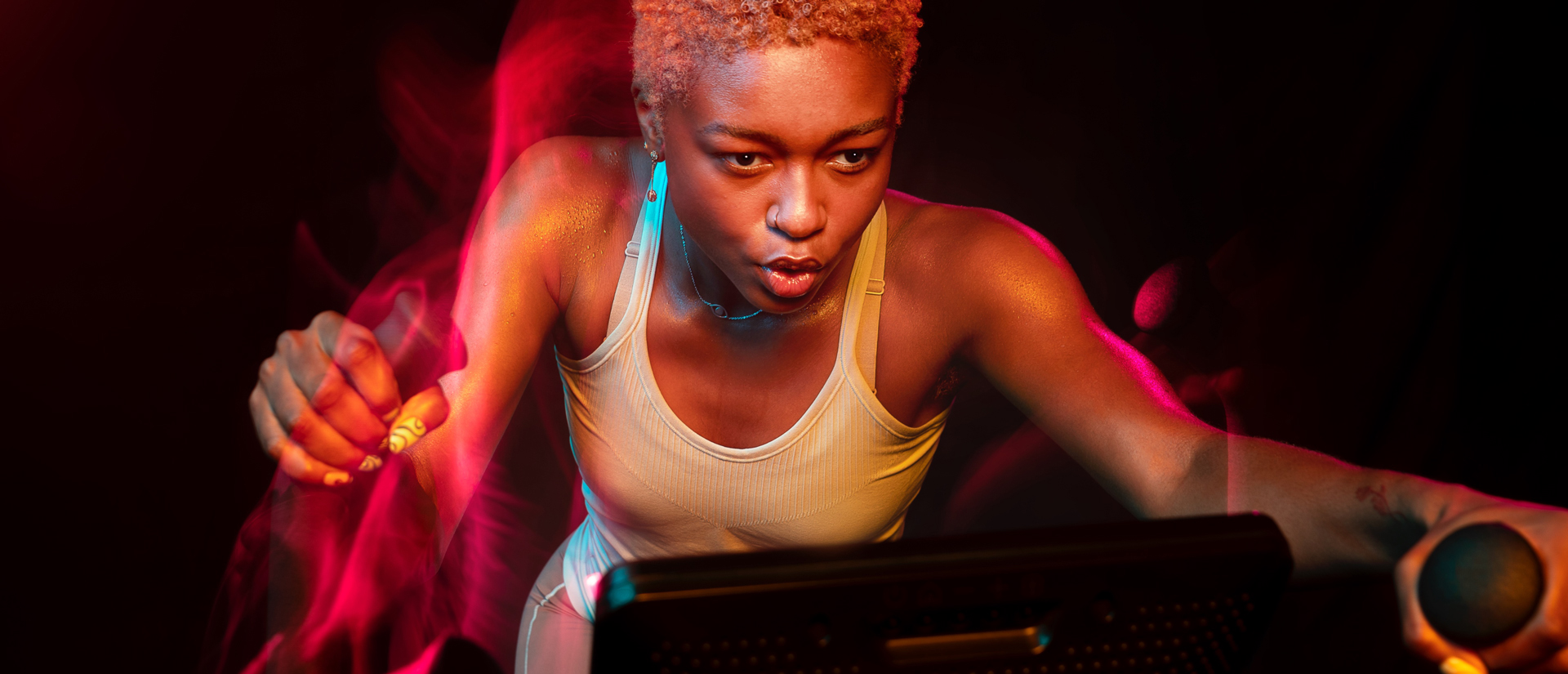 Woman working out on a Bowflex Max Trainer M9