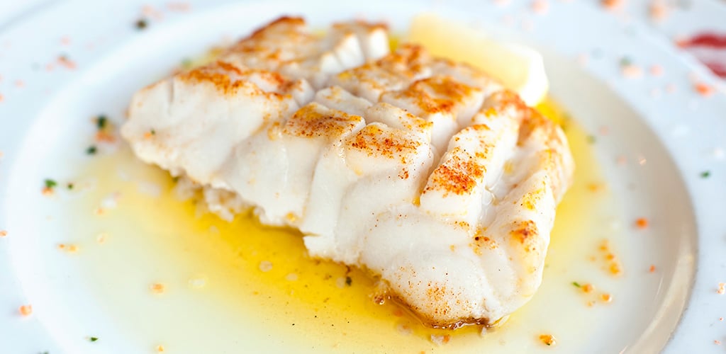 cod topped with herbs