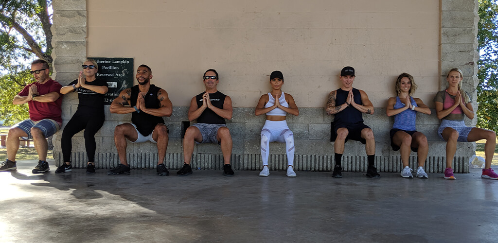 people doing wall sits