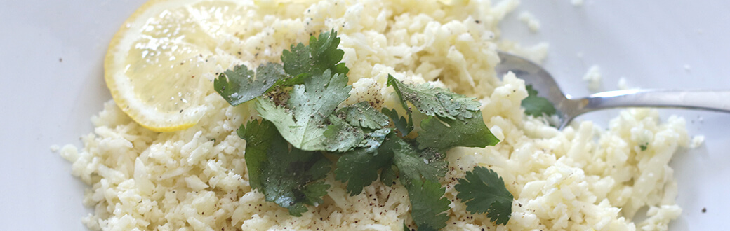 Lemon and garlic cauliflower rice topped with cilantro.