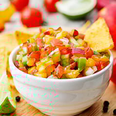 Close up image of fresh peach picco de gallo.