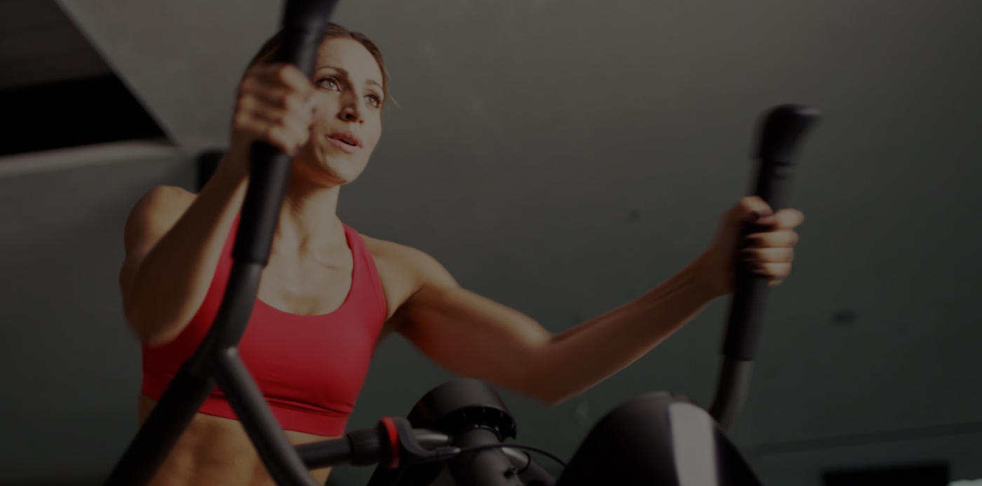 Amy working out on a Max Trainer