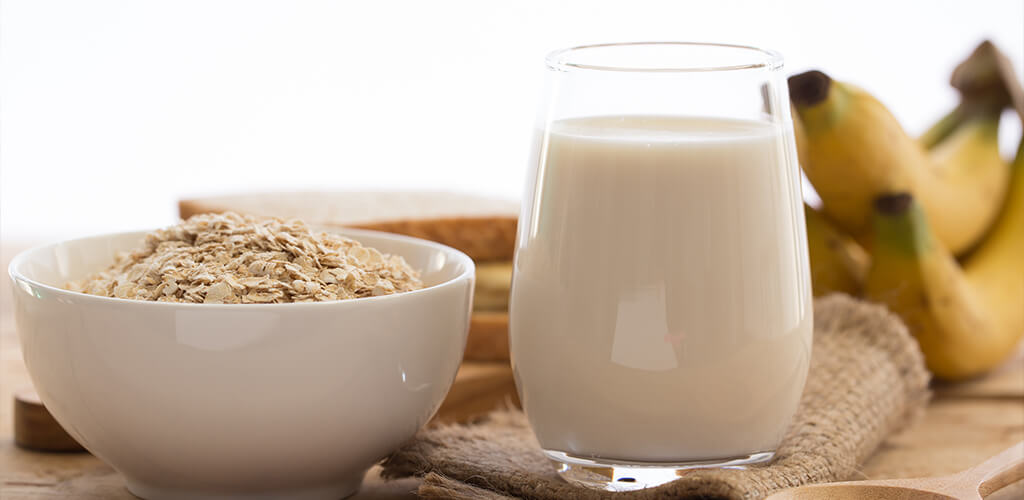 a glass of oat milk