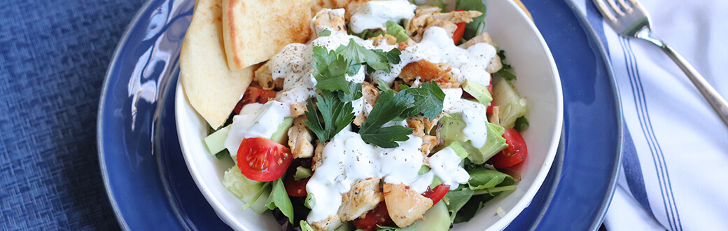 Chicken shawarma bowls with flat brand and homemade tzatziki sauce.