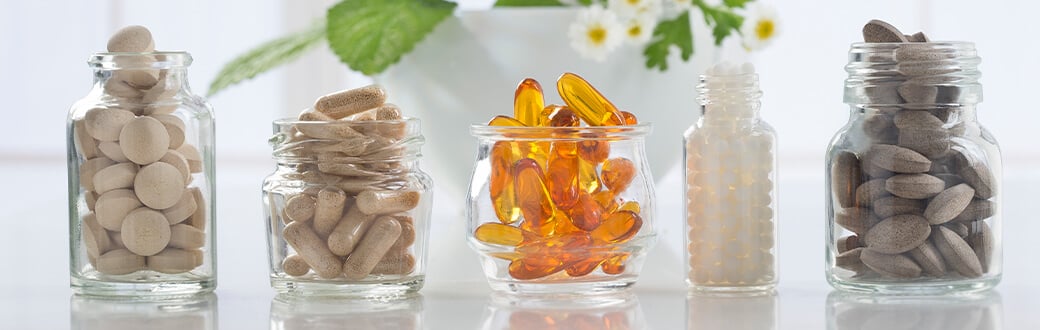 Vitamins and nutritional supplements in small jars