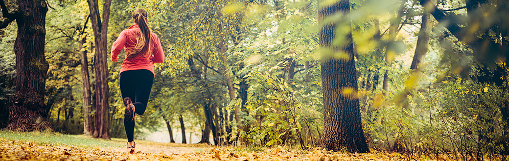 A woman running outside.