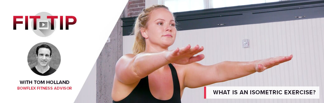 A woman performing an isometric exercise.