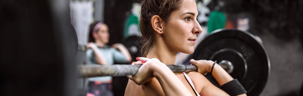 A woman lifting weights.