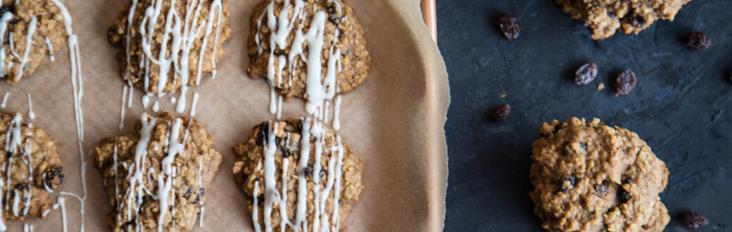 Oatmeal raisin cookies drizzled with maple icing.