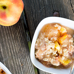 Grain-Free No-Sugar Added Peachy Crisp in a bowl.