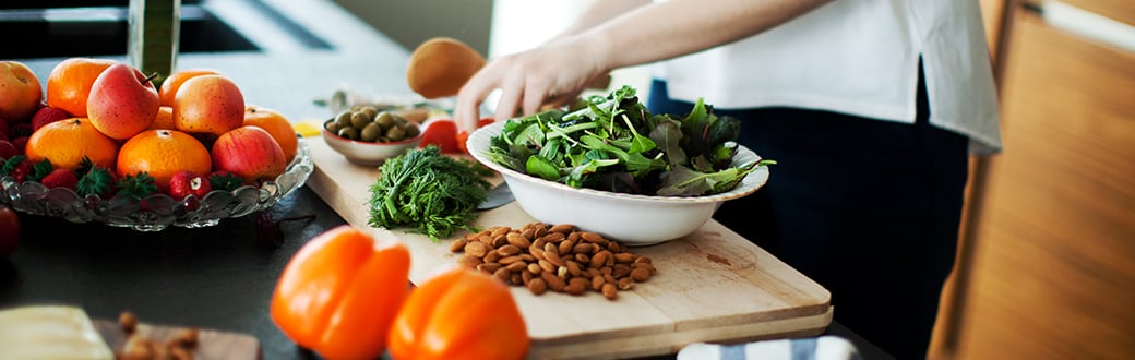 A person chopping vegetables.