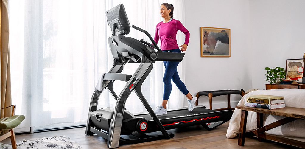 A woman using a Treadmill 22.