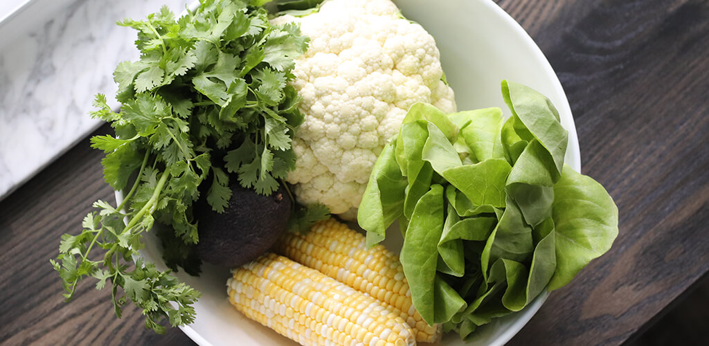 Cauliflower, cilantro, lettuce, and corn.
