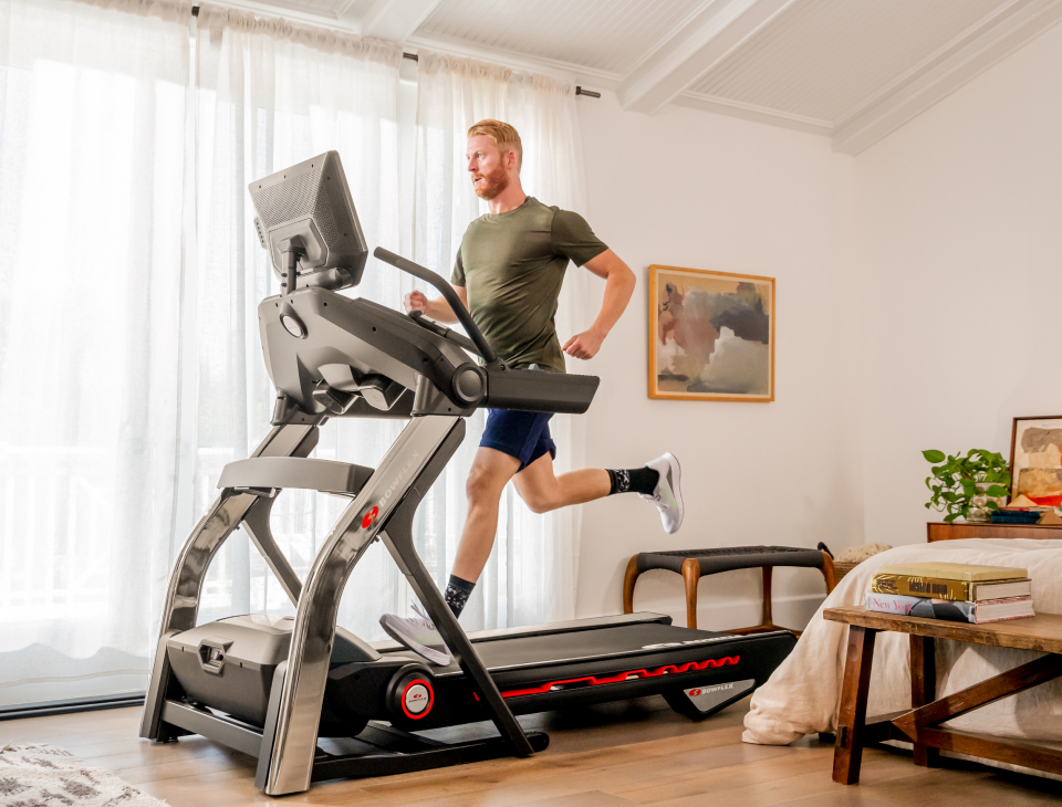 man running on treadmill