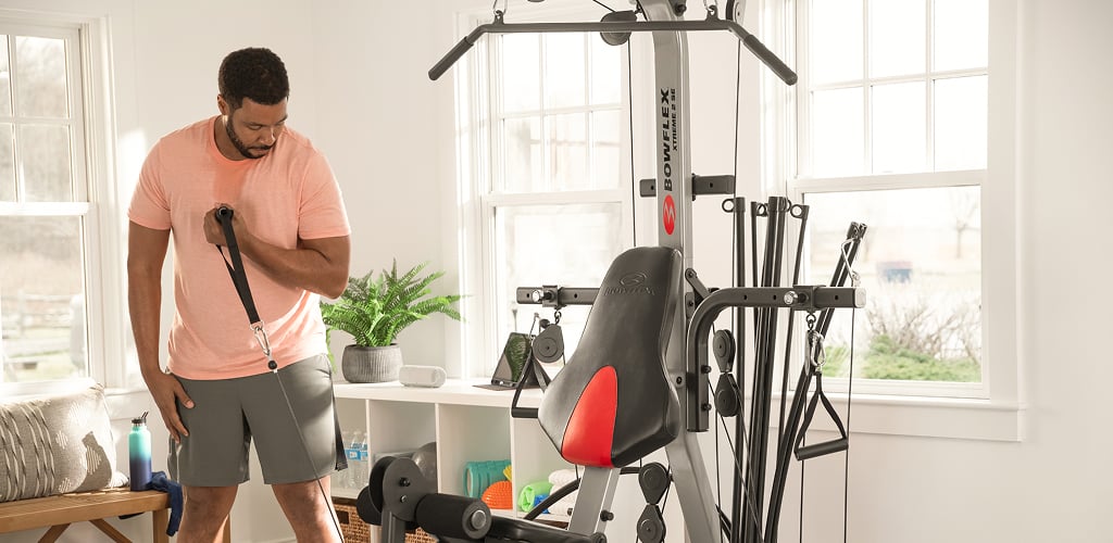 man using xtreme 2 se homegym
