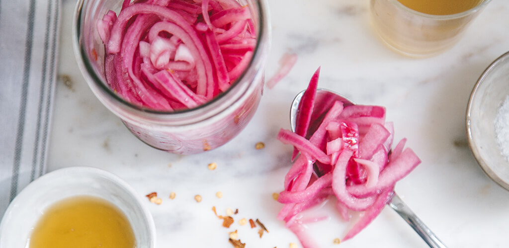 a jar of pickled red onions.