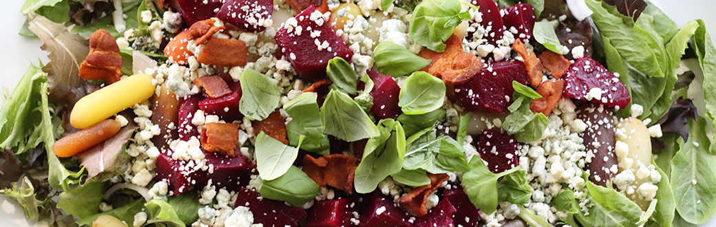 Baby beet salad on a serving dish.