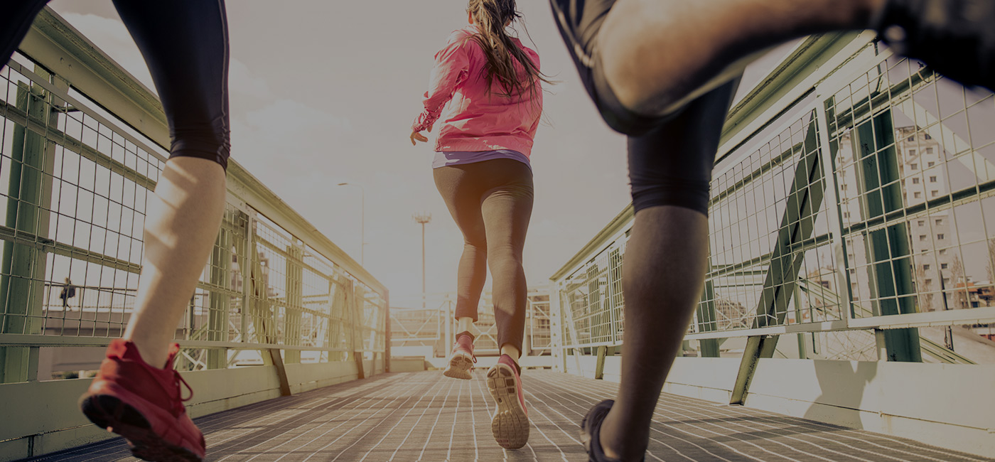three women running outside