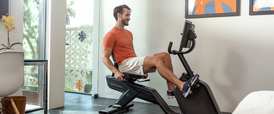 Man riding a Schwinn 290 Recumbent Bike