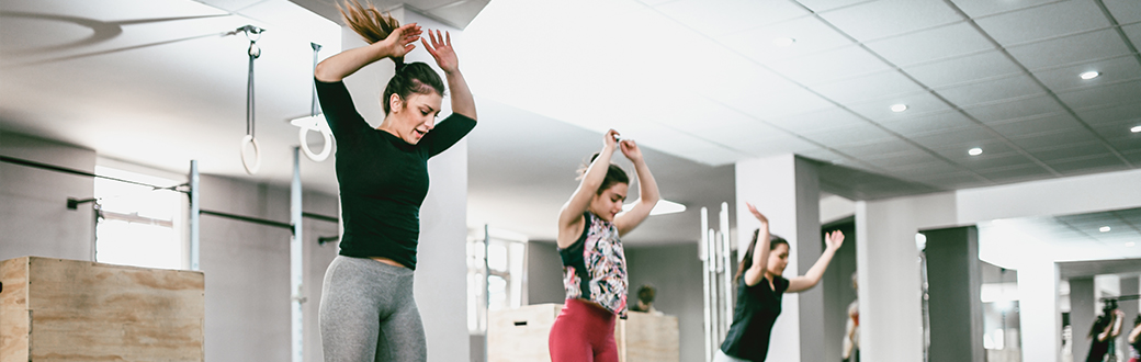 women jumping in synchrony