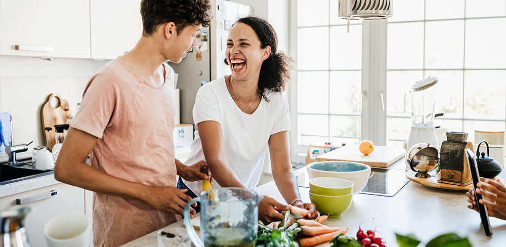 Two people in a kitchen