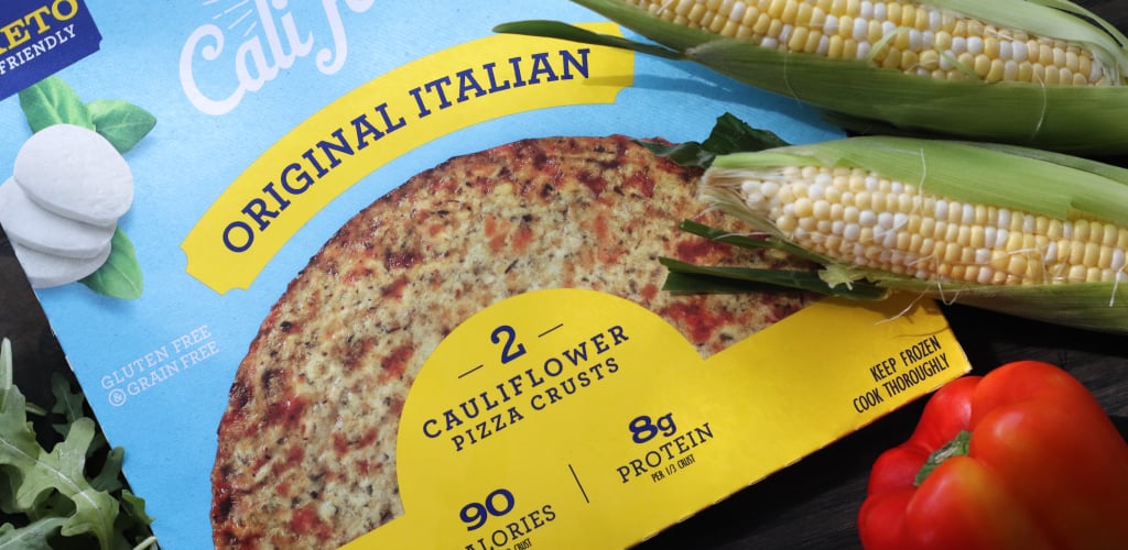 cauliflower pizza crust, bell peppers, arugula and corn