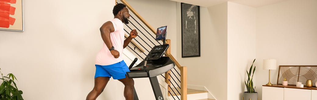 man running on a bowflex treadmill