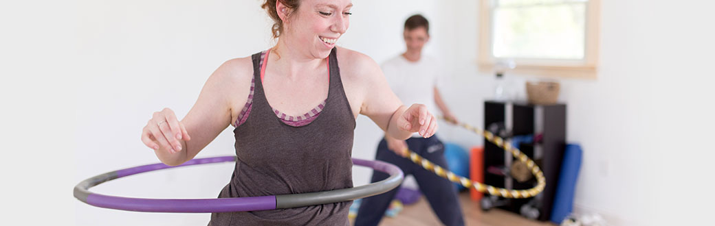 A person using a hula hoop.