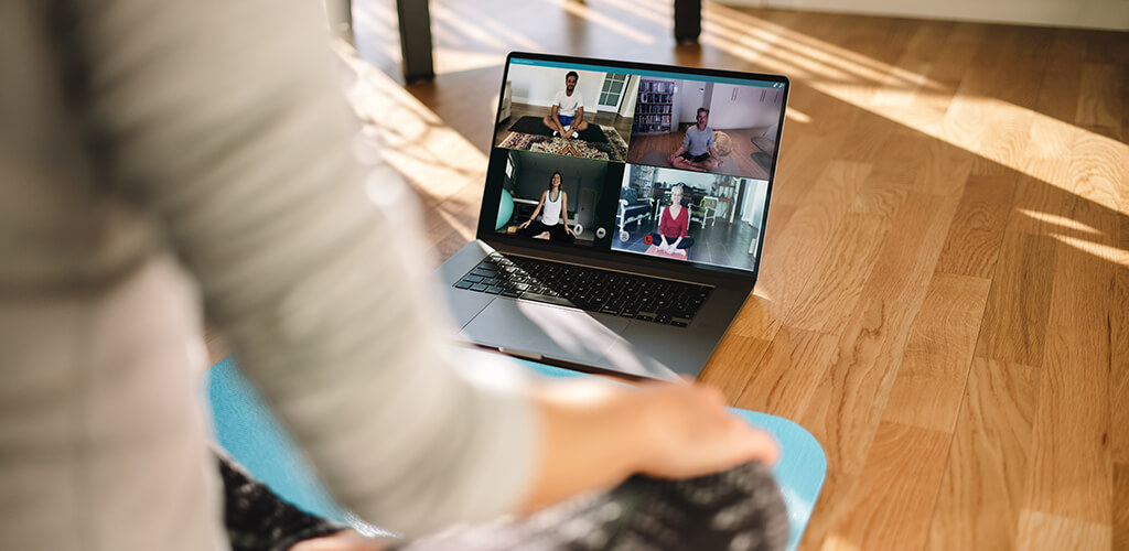 a person participating in a virtual meditation class