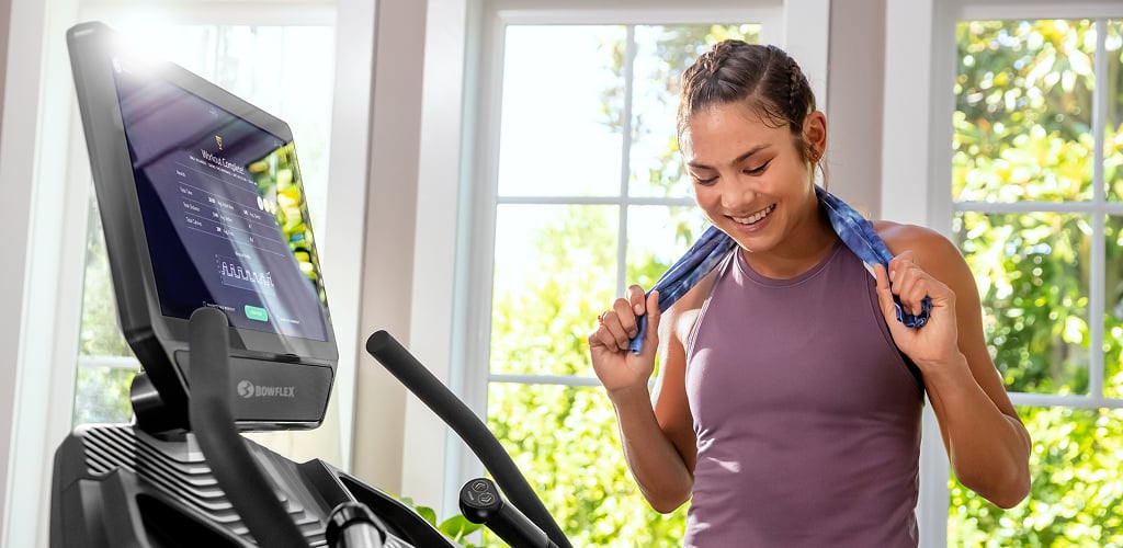 woman using a bowflex treadmill