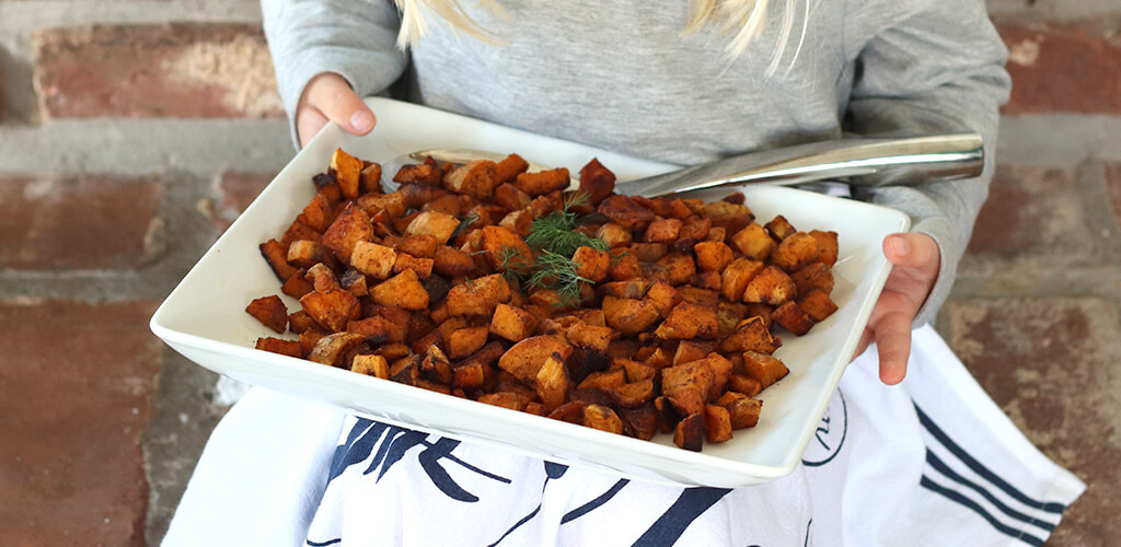 roasted sweet potatoes in a serving dish
