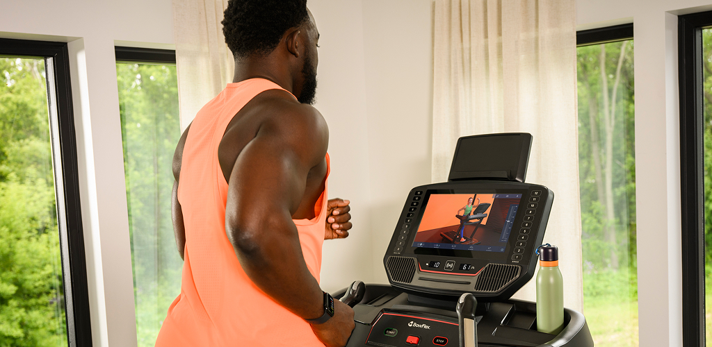 man on a bowflex t16 treadmill