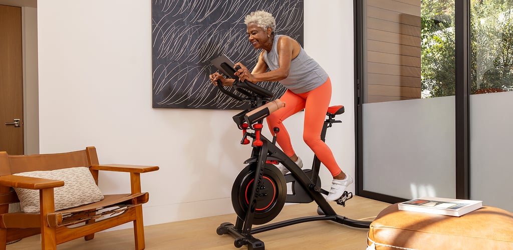 woman riding an exercise bike