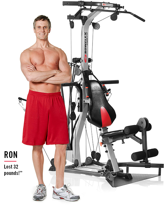 Ron lost 32 pounds.  Ron is standing next to a home gym.